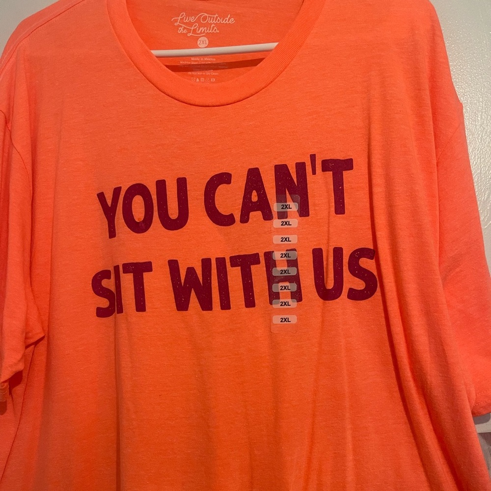Orange T-shirt “you can’t sit with us”